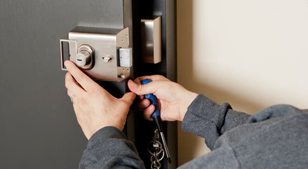 Locksmith Opening a Door